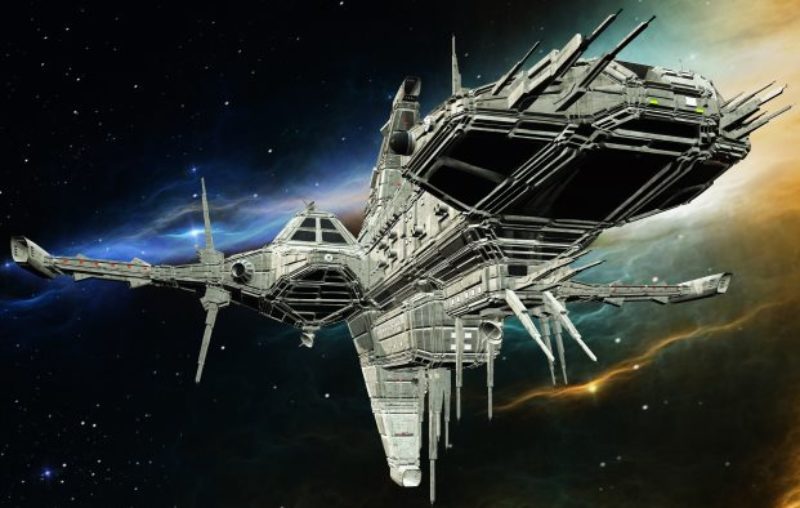 A heavily armed starship cruising through a nebula